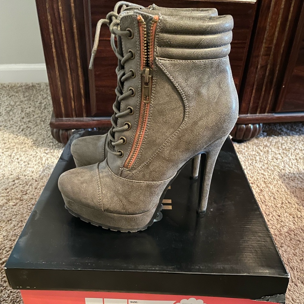 Taupe Stiletto Booties with outer zipper and laces.